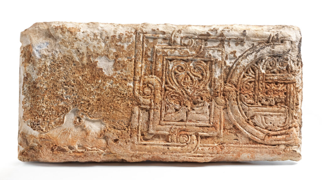 Spolia lintel fragment with geometric depictions