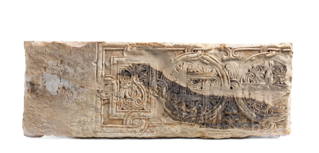 Spolia lintel fragment with geometric depictions