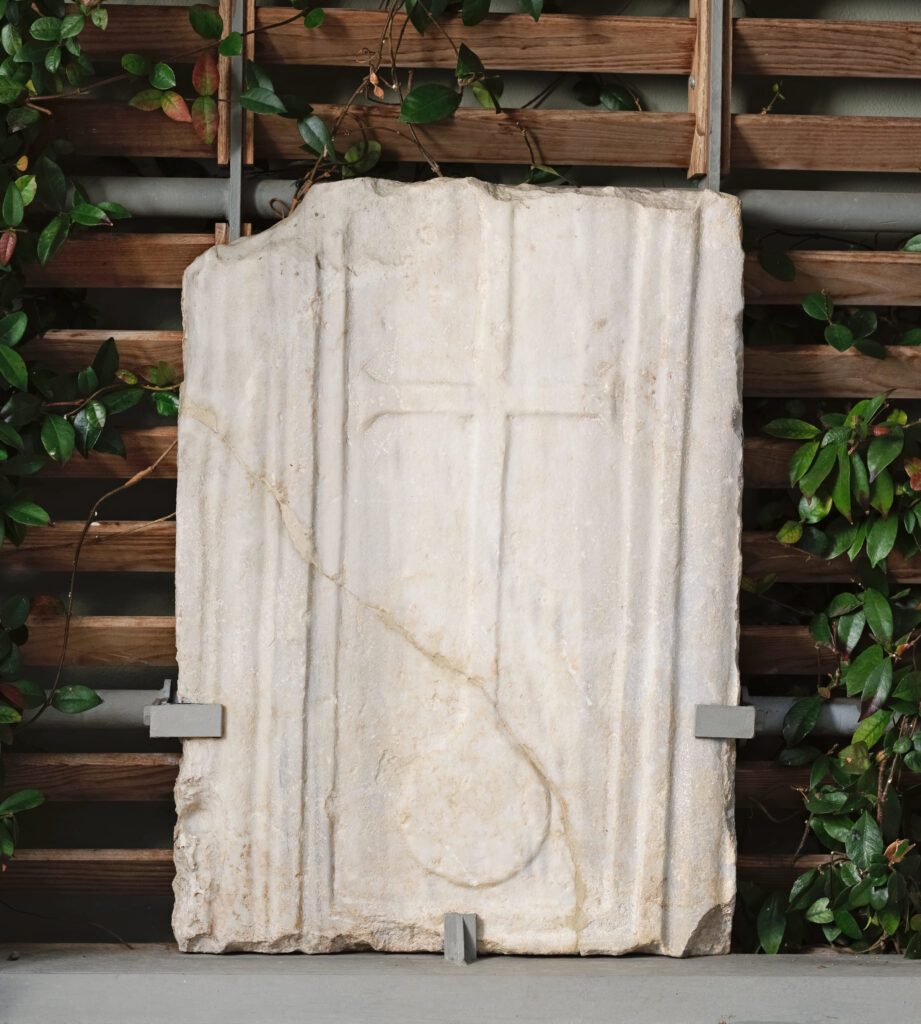 Spolia stone plate with cross depiction